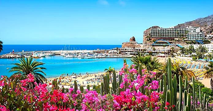 Puerto Rico, Gran Canaria — Sun-filled hillsides, sea views, marina leisure, and easy holiday-home ownership.